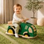 Preview: Traktor Rutschauto aus Holz mit Kind auf grünem Mähteppich im Kinderzimmer.