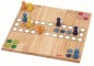 Preview: Klassisches Ludo-Spielbrett aus hellem Holz; auf den weißen Feldern stehen verschiedene bunte Holzfiguren in Gelb, Grün, Blau, Rosa und Orange