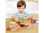 Preview: Spielendes Kind beim schneiden der Spielzeug Pizza