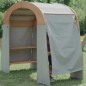 Preview: Draussen im Garten das massive Outdoor Spielhaus mit praktischem Sonnensegel von Holz Spielzeug Peit ist vielseitig einsetzbar