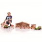Preview: Puppenhaus mit spielendem Kind