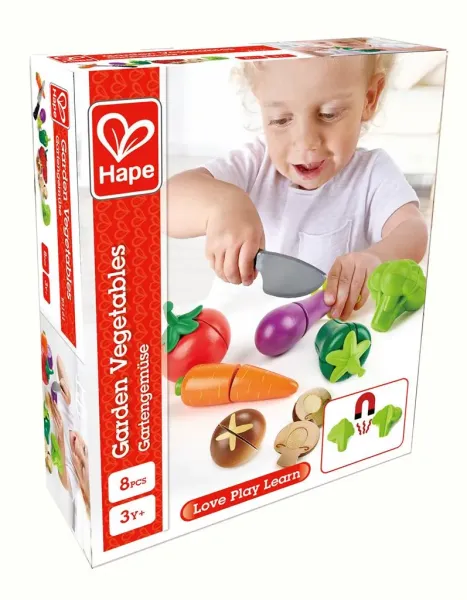 Umkarton vom Gartengemüse Set mit Tomate, Möhre, Paprika und Holzmesser.