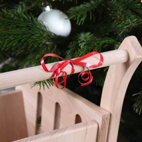 Kinder Einkaufswagen mit Schleife im Weihnachtslook